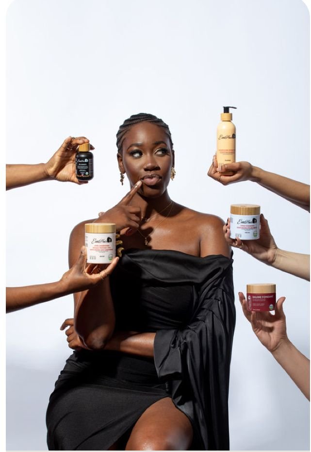 Woman surrounded by hands offering skincare products